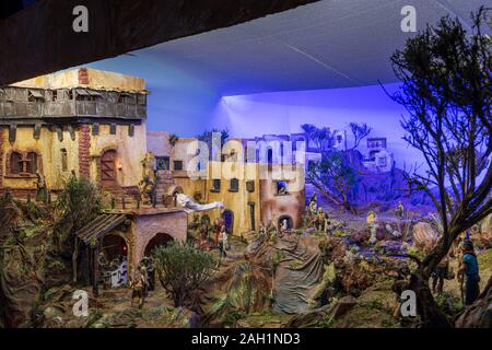 Nativity scene showing the village of Bethlehem with details from the ...