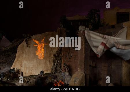 Nativity scene showing the village of Bethlehem with details from the ...