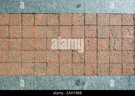 Texture of floor close up cement square pattern orange brick and grey marble Stock Photo