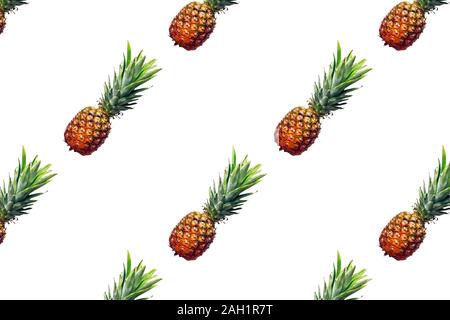 Creative food pattern with pineapples on white background Stock Photo
