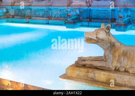 Particular of Fonte Gaia (1400s) at night in the Piazza del Campo, Siena, Italy. Stock Photo