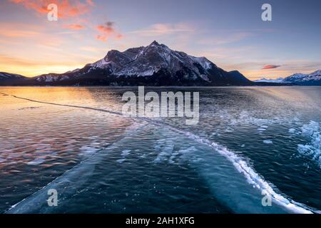 Ice cracks and trapped methane bubbles  Abraham Lake,  Alberta, BC, Canada, Stock Photo