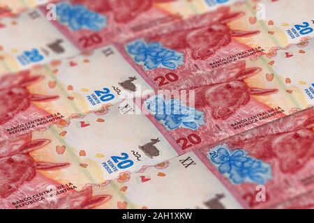 Closeup Argentine pesos banknotes background. ARS pattern. 20 peso macro photography Stock Photo