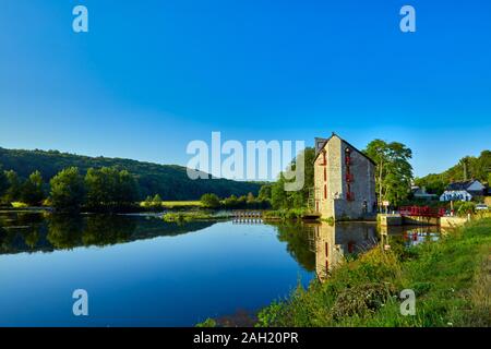 Image of La Villaine River and canal lock early morning with trees and grass Stock Photo