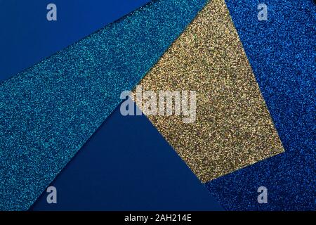 Abstract geometric paper background in blue tones. Color of the year 2020 classic blue. Stock Photo