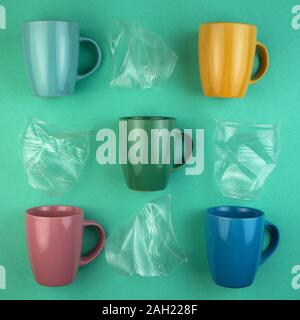 Ecology concept stop plastic pollution. Plastic waste. Pattern from ceramic mugs and plastic cups. Stock Photo