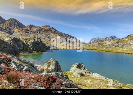 The Longet lakes, in the upper Varaita Valley, on the border between Italy and France, mirror the Alpine peaks, among which Monviso, King of stone, s Stock Photo