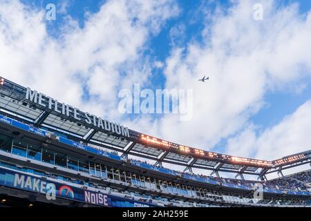 East Rutherford, New Jersey - December 15, 2019: Airplane Flying Over MetLife Stadium During a New York Giants Game. Stock Photo