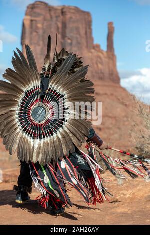 Navajo Dancer, West Mitten Butte in background, Monument Valley, Arizona and Utah border, USA Stock Photo