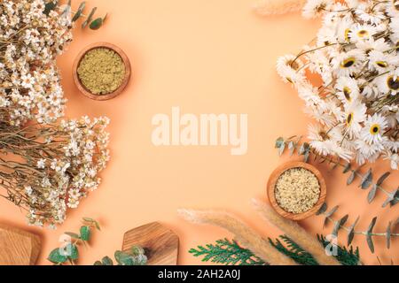 Modern apothecary concept. Herbs, collagen and essential oils in still life compositions Stock Photo