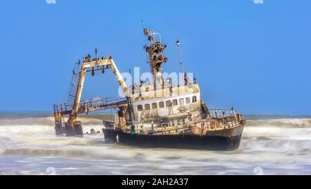 A long exposure shot of a fishing trawler shipwrecked on the Skeleton Coast of Namibia, covered with nesting birds. Stock Photo