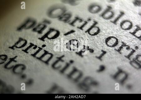 Word paper printed on book page, close-up Stock Photo