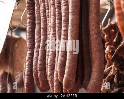 Serbian Kulen Kobasica sausage, handmade, hanging and drying in the coutryside of Serbia. Kulen is a traditional pork sausage, dry and cured, from Cro Stock Photo