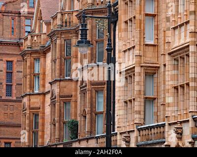 Colorful terracotta facades of apartment buildings in the Mayfair district of London, England Stock Photo