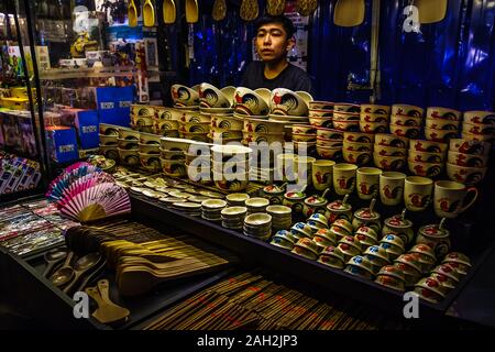 Melaka, Malaysia - Dec 15, 2019 : Jonker Street in the Chinatown neighborhood of Melaka is filled with tourists, shops, restaurants, and Peranakan arc Stock Photo