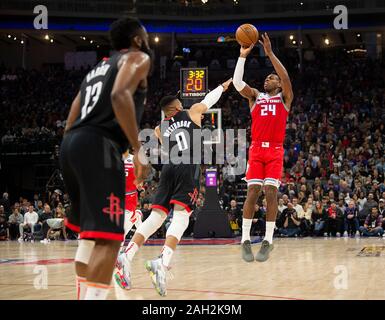 Sacramento, CA, USA. 23rd Dec, 2019. Sacramento Kings guard Buddy Hield (24) shoots over Houston Rockets guard Russell Westbrook (0) for three-points during a game at Golden 1 Center on Monday, Dec 23, 2019 in Sacramento. Credit: Paul Kitagaki Jr./ZUMA Wire/Alamy Live News Stock Photo