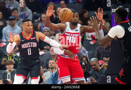 Sacramento, CA, USA. 23rd Dec, 2019. Sacramento Kings forward Harrison Barnes (40) and Houston Rockets guard Russell Westbrook (0) look for ball during a game at Golden 1 Center on Monday, Dec 23, 2019 in Sacramento. Credit: Paul Kitagaki Jr./ZUMA Wire/Alamy Live News Stock Photo