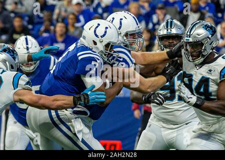 Indianapolis, Indiana, USA. 22nd Dec, 2019. Indianapolis Colts quarterback Jacoby Brissett (7) carries the ball in the first half of the game between the Carolina Panthers and the Indianapolis Colts at Lucas Oil Stadium, Indianapolis, Indiana. Credit: Scott Stuart/ZUMA Wire/Alamy Live News Stock Photo