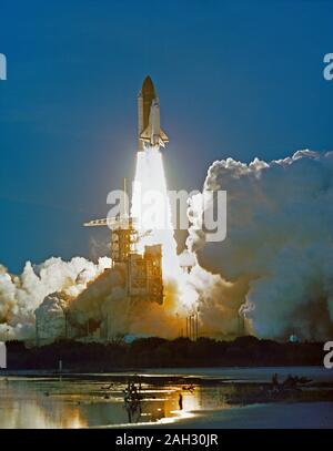 The space shuttle Discovery heads for orbit from the Kennedy Space ...