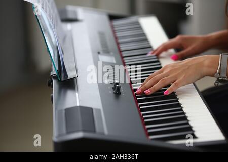 Female performs beautiful melody Stock Photo