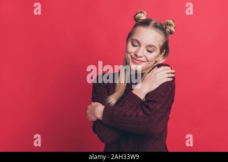 I feel tranquility concept. Closeup photo of pretty with closed eyes hipster enjoying handmade handicraft maroon color jumper pullover isolated pastel Stock Photo