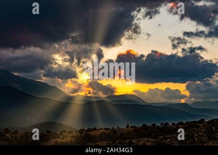 sunset in the clouds after the rain Stock Photo