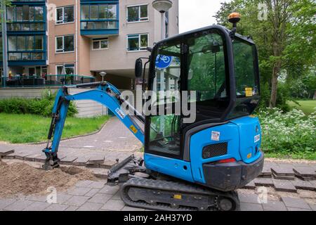 Small Excavator At Amsterdam The Netherlands 2019 Stock Photo