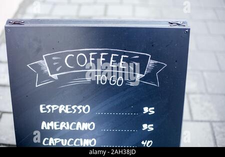 Black outdoor sign coffee to go on the street, menu, outside Stock Photo