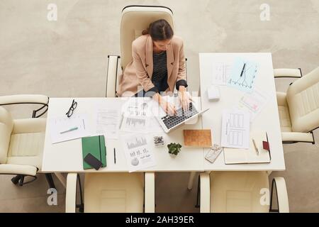 Asian woman professional working from home using laptop computer ...