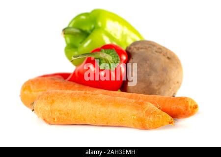 Carrots, beet, sweet red and green peppers isolated on white background. Stock Photo