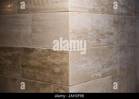 natural marble in yellow shade with white vines. Natural marble abstract background. Stock Photo