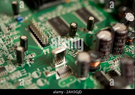 detail of a computer motherboard or printed circuit board containing the principal components of a computer Stock Photo