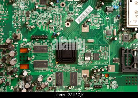 detail of a computer motherboard or printed circuit board containing the principal components of a computer Stock Photo
