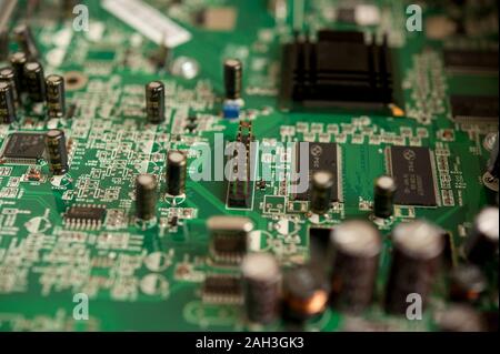 detail of a computer motherboard or printed circuit board containing the principal components of a computer Stock Photo