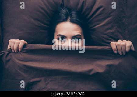 Close-up portrait of her she nice attractive lovely cheerful cheery funny childish girlish girl covering hiding face dark marsala burgundy maroon veil Stock Photo
