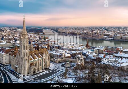 Aerial cityscape from Budapest with cloudly sky, Matthas church, fishermans bastion, Danube river and Hungarian Parliament. Stock Photo