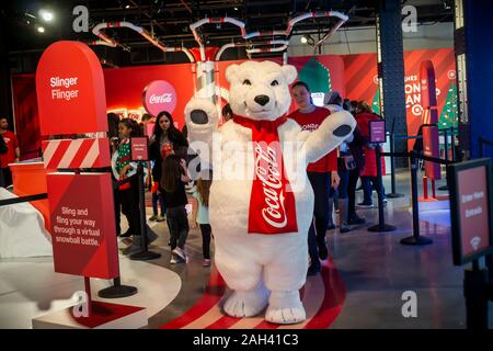 A brand ambassador wears a polar bear costume at the Coca-Cola brand activation at the Target 'Wonderland!' pop-up store in the Meatpacking District in New York on its grand opening day, Friday, December 13, 2019. The pop-up, featuring numerous instagrammable moments as well as product experiences, is open until December 22. (© Richard B. Levine) Stock Photo