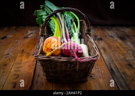 Assorted beets in basket Stock Photo