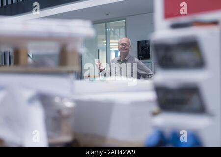 Manager working in printing house Stock Photo