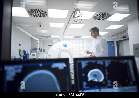 Radiologist at a x-ray machine in a hospital Stock Photo
