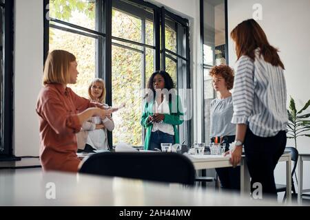 Businesswomen having a meeting in office Stock Photo
