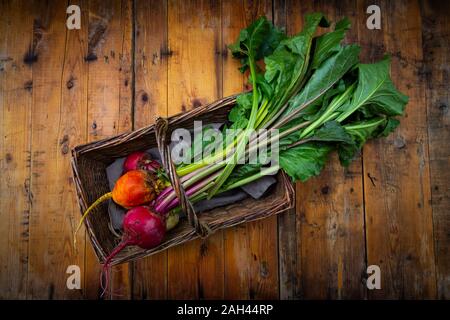 Assorted beets in basket Stock Photo