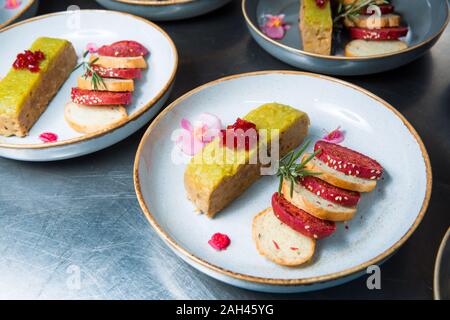 Duck terrine with autumn fruit and red wine jelly. Stock Photo