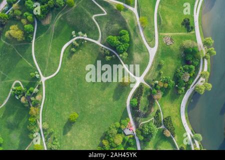 Germany, Bavaria, Munich, Aerial view of footpaths across Olympiapark in summer Stock Photo