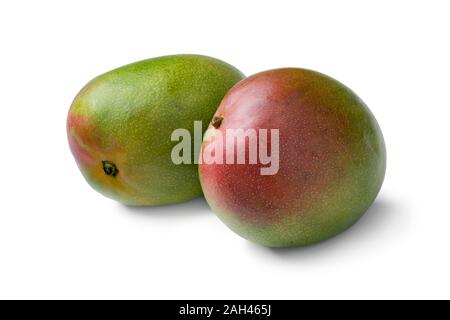 Pair of fresh whole mangoes isolated on white background Stock Photo
