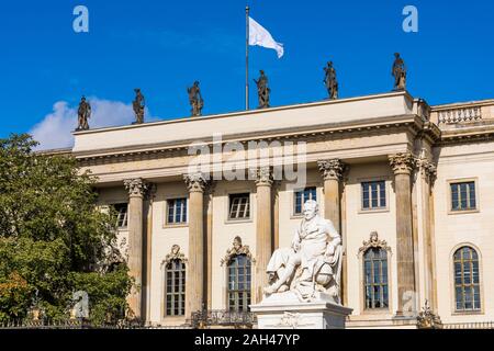 Germany, Berlin, Mitte, Unter den Linden, Humboldt University of Berlin and Alexander von Humboldt statue Stock Photo