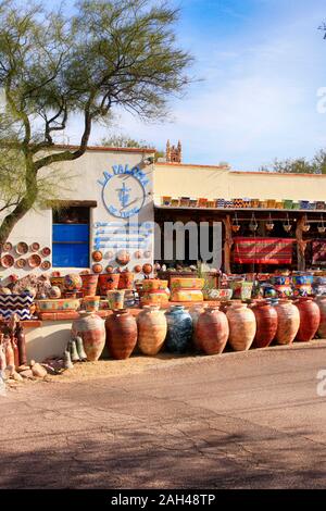 Colorful Mexican pots, stonewear and sculptures outside La Paloma store in Tubac, Arizona Stock Photo