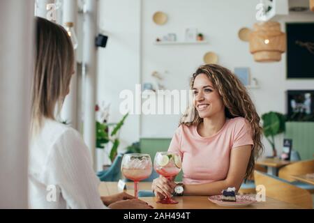 Young women having fun in a restaurant Stock Photo