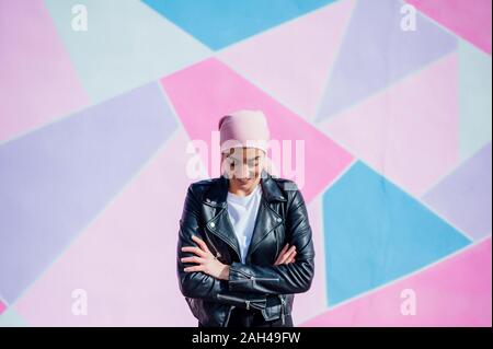 Portrait of woman with pink headscarf, has cancer Stock Photo