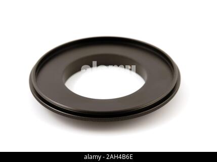 Macro reverse ring for DSLR  SLR camera on  white background Stock Photo